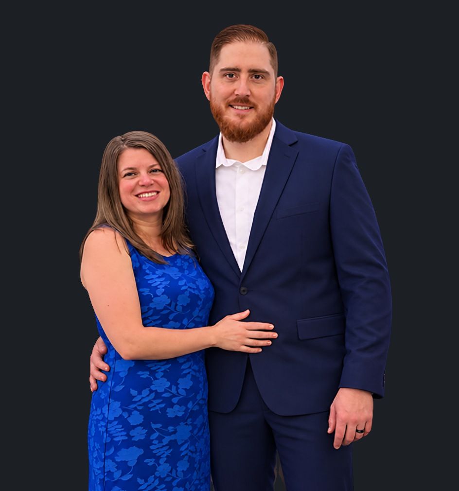 Kyle and Christina Melton, the husband and wife team behind Melton Studios, standing together